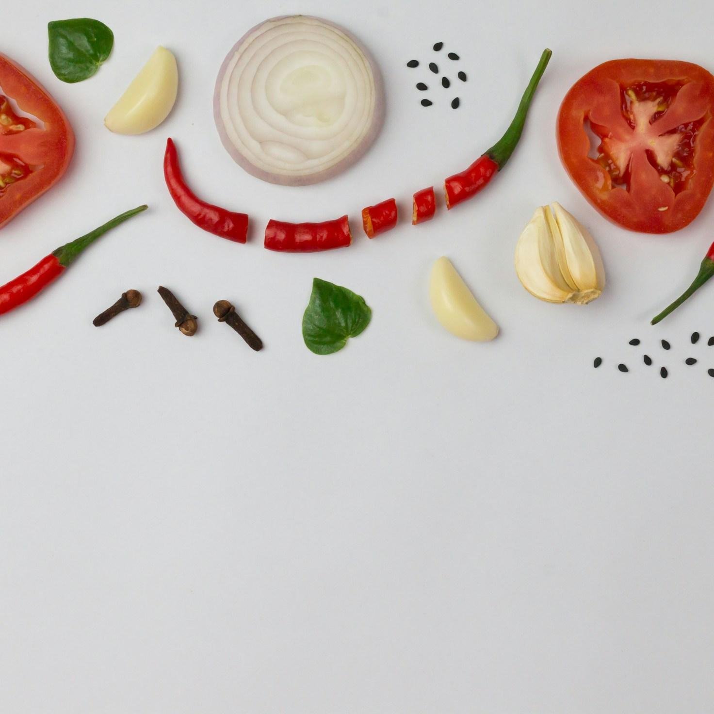 Community members collaborating in a modern kitchen space, sharing recipes and cooking techniques
